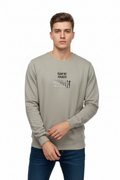 Upper body photo with sleeves pushed up casual pose